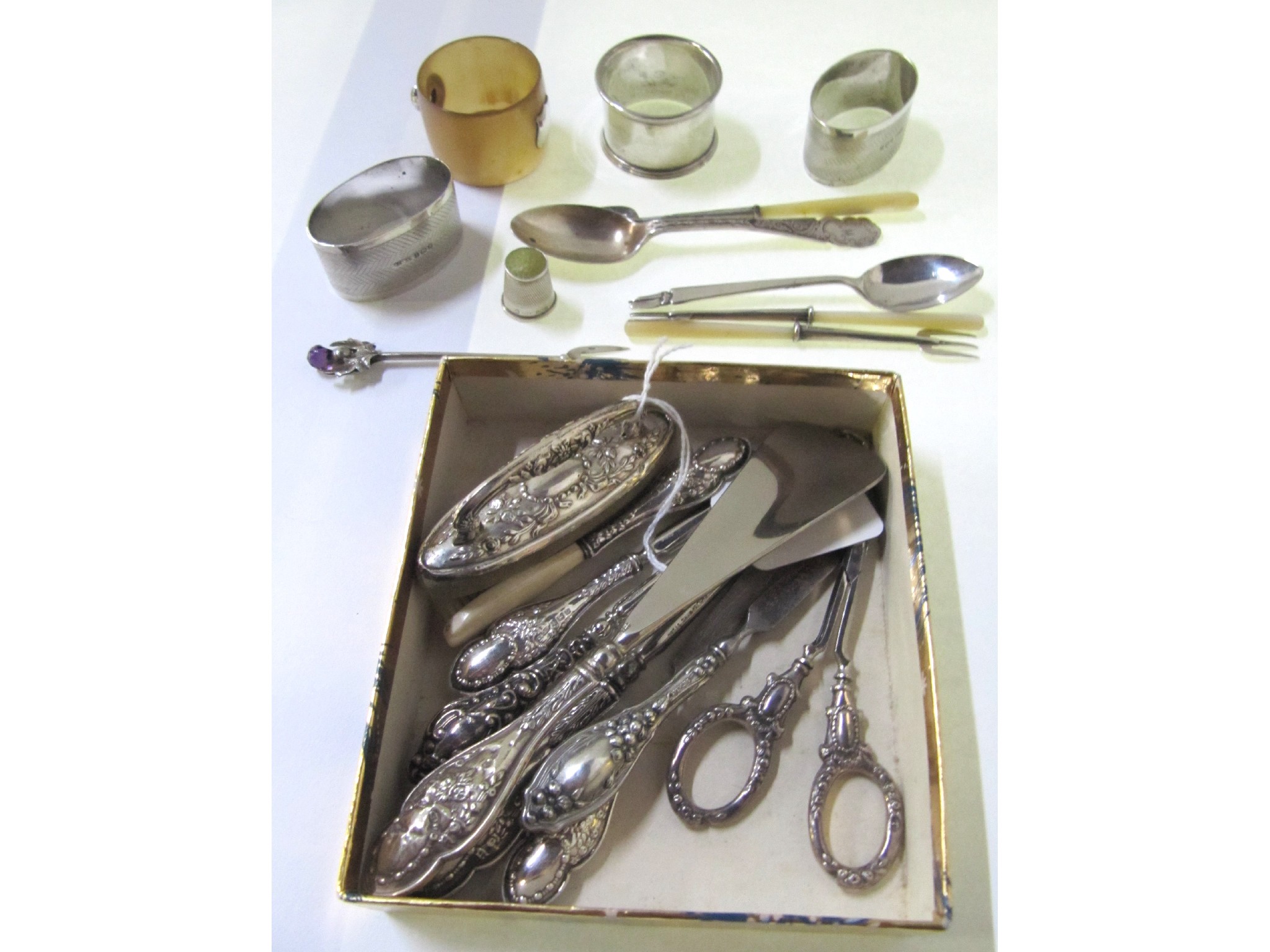 Appraisal: A lot comprising a silver manicure set Birmingham silver napkin