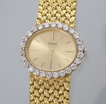 Appraisal: An k and Diamond Piaget Watch k yellow gold case