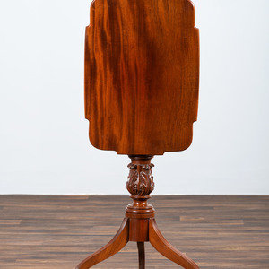 Appraisal: A Late Federal Carved and Figured Mahogany Shaped Top Candlestand