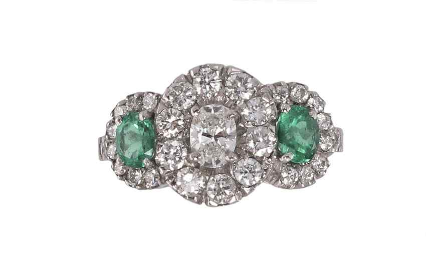 Appraisal: KT DIAMOND AND EMERALD RING K white gold ring contains