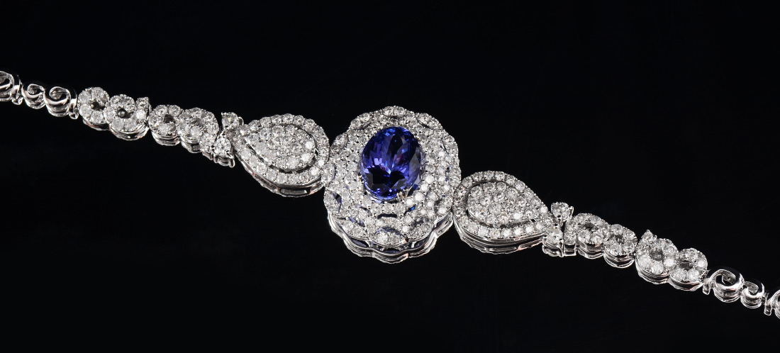 Appraisal: A DAZZLING K TANZANITE AND DIAMOND BRACELET Featuring a Ct