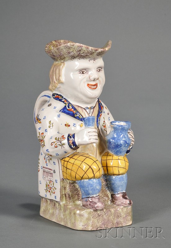 Appraisal: French Faience Toby Jug France th century polychrome enamel decorated