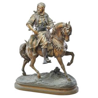 Appraisal: AFTER GUILLAUME COUSTEAU French Orientialist figure on horseback Patinated metal