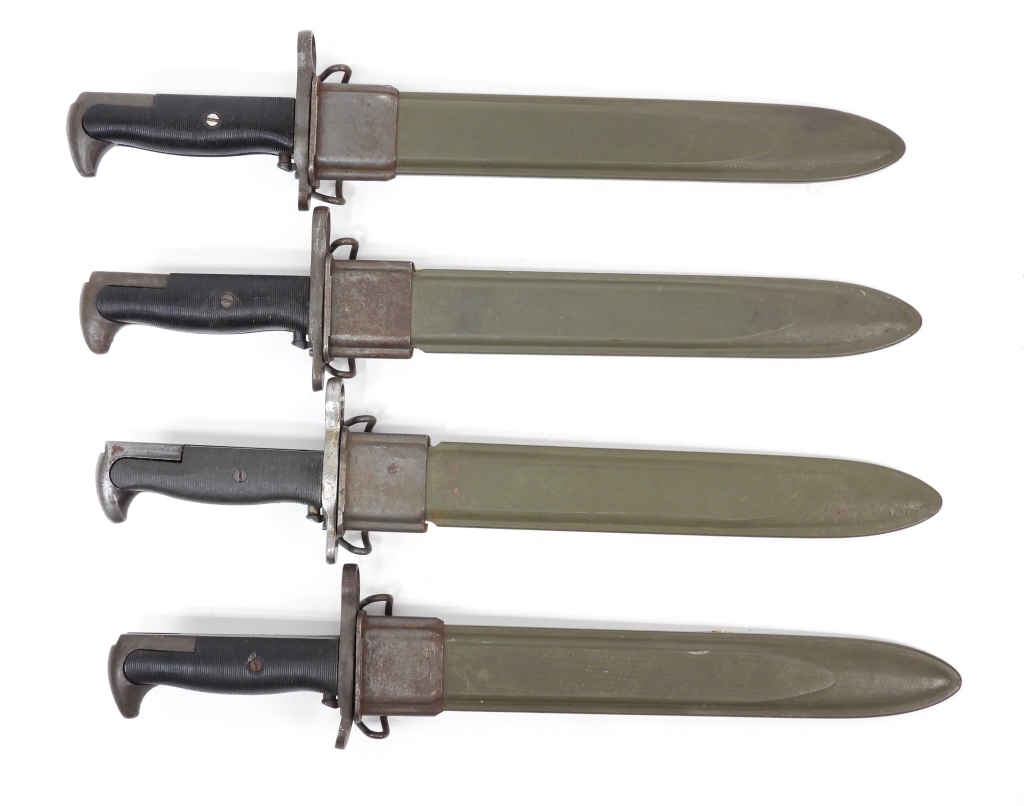 Appraisal: FOUR WWII U S M GARAND BAYONETS AND SCABBARDS United