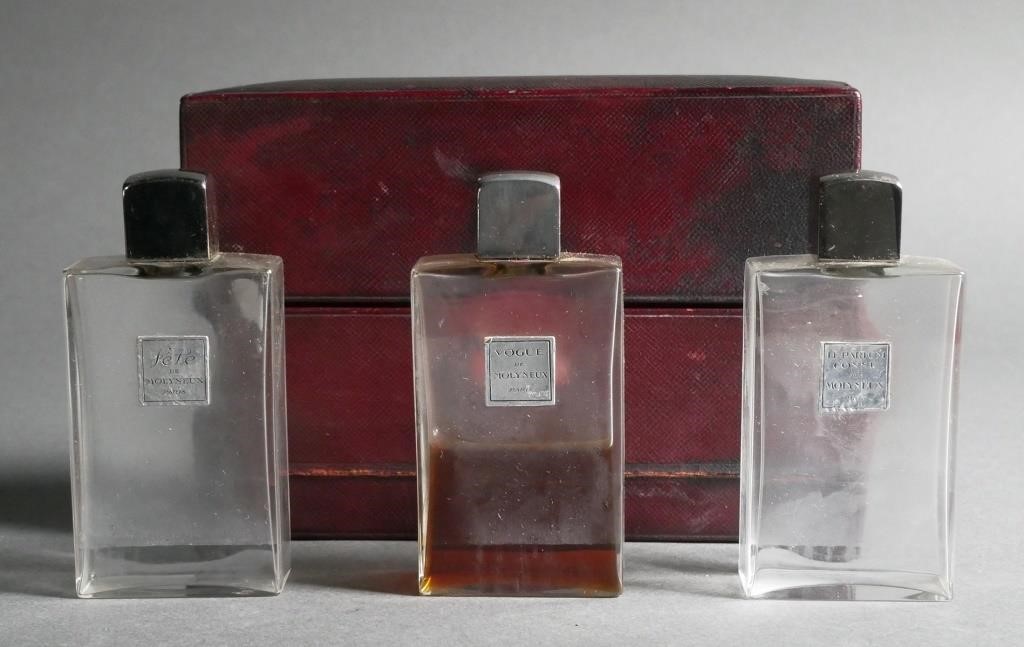 Appraisal: Leather box of three Molyneux crystal perfume bottles each bottle