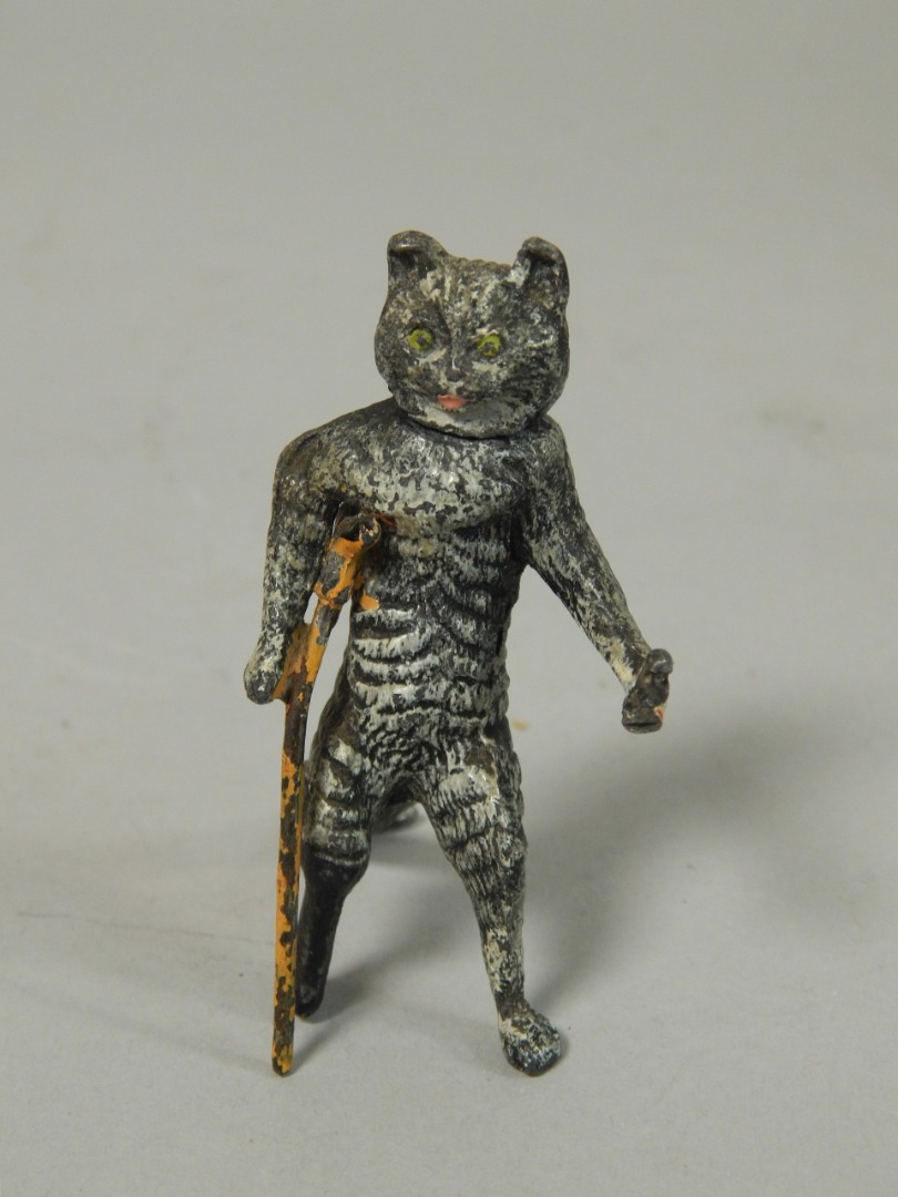 Appraisal: A cold painted spelter figure of a nodding cat with