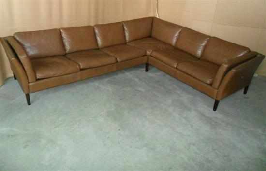 Appraisal: A DANISH BROWN LEATHER CORNER SOFA