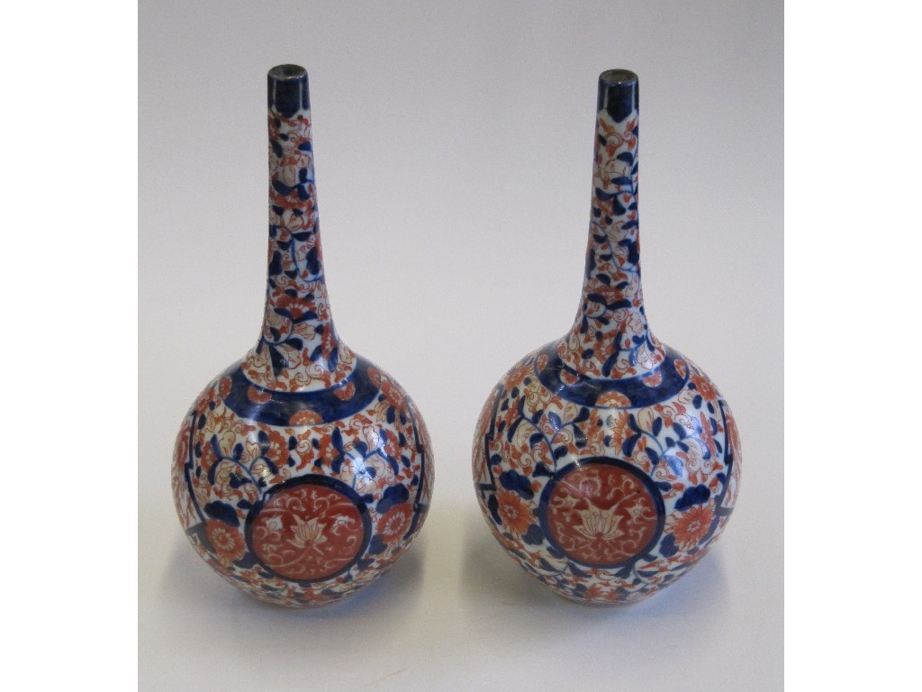 Appraisal: Pair of Imari palette bottle vases