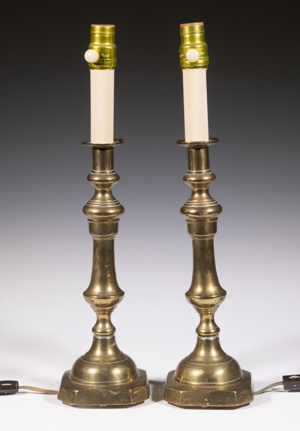 Appraisal: PR ELECTRIFIED VICTORIAN BRASS CANDLESTICKS Pair of English Candlesticks Wired