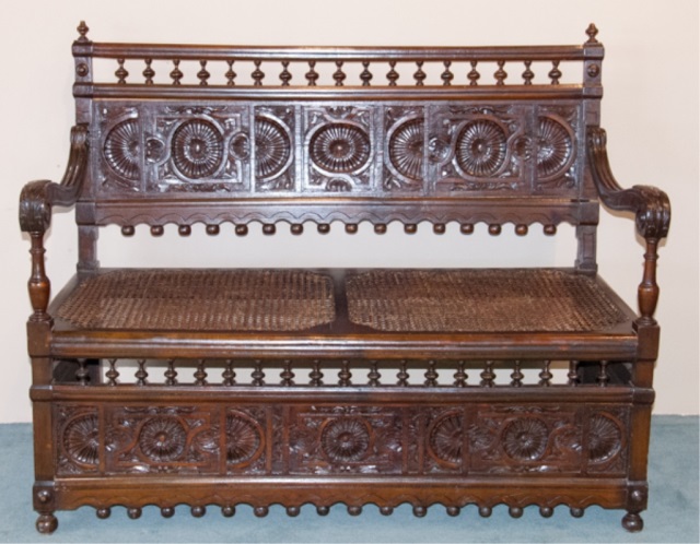 Appraisal: Renaissance Style Hall Settee Carved back panel with turned spindles