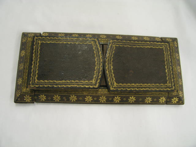 Appraisal: Antique Leather Book Rack collapsible gold tooling x closed