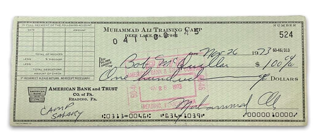 Appraisal: Muhammad Ali Hand Signed Check Original paycheck from Muhammad Ali's