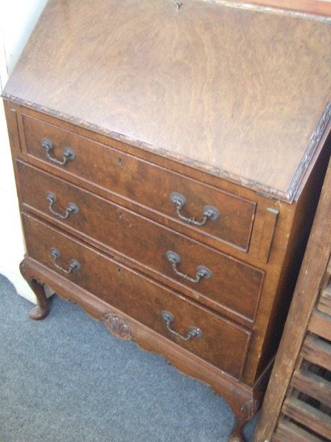 Appraisal: A th century walnut bureau the fall enclosing a fitted