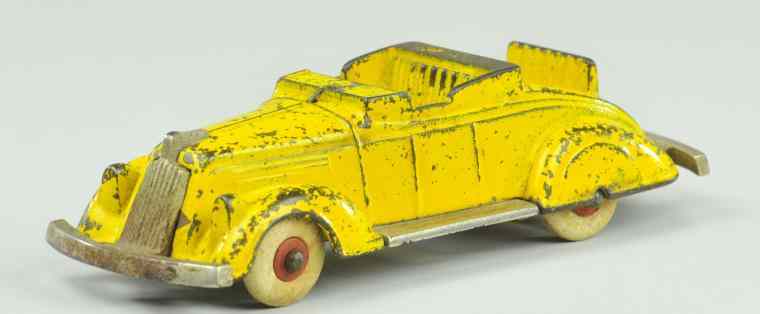 Appraisal: KENTON ROADSTER WITH RUMBLE SEAT Painted in yellow cast iron