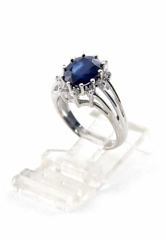 Appraisal: Platinum and sapphire ring center set with oval-cut blue sapphire