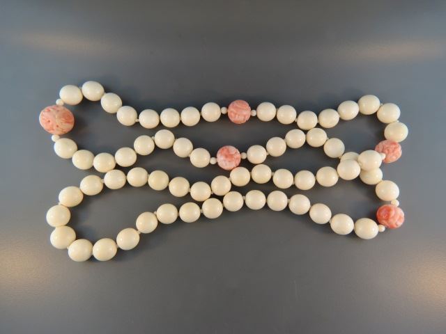 Appraisal: Chinese Carved Coral and Ivory Necklace coral beads measuring up