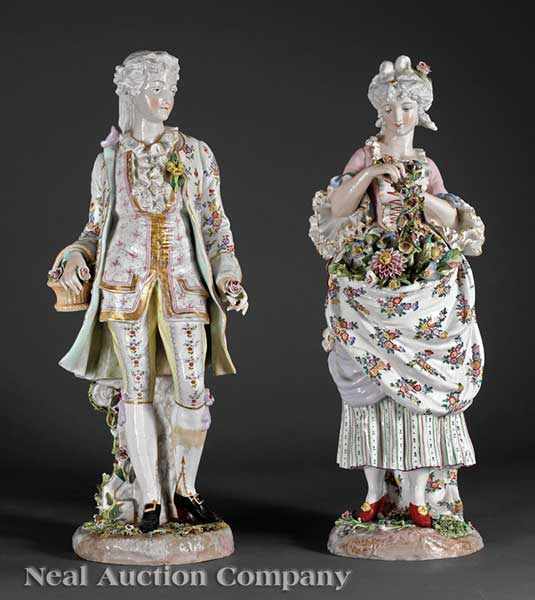 Appraisal: Two Continental Polychrome Porcelain Figures of a Lady with Garlands