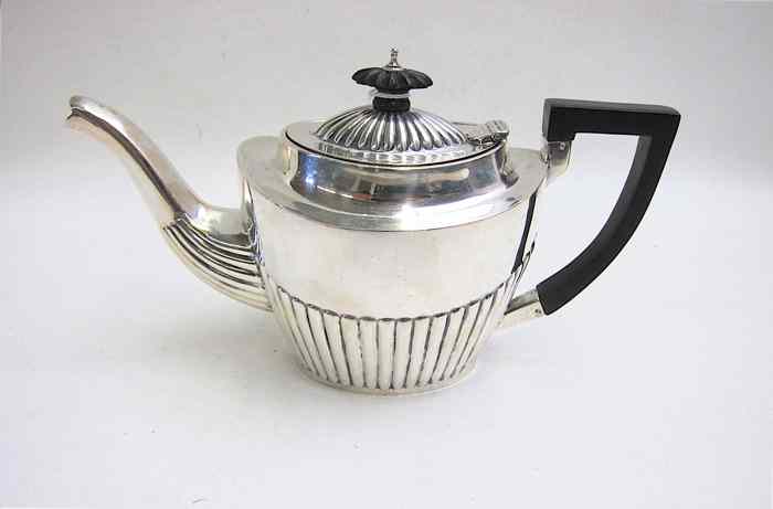 Appraisal: ENGLISH STERLING SILVER TEAPOT hallmarked British sterling city Chester year