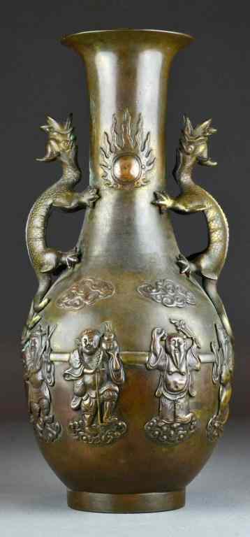 Appraisal: Chinese Qing Bronze VaseDepicting the eight imortals amongst ruyi clouds