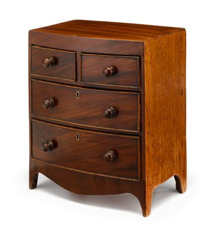 Appraisal: Miniature English mahogany bowfront chest of drawers th century Two