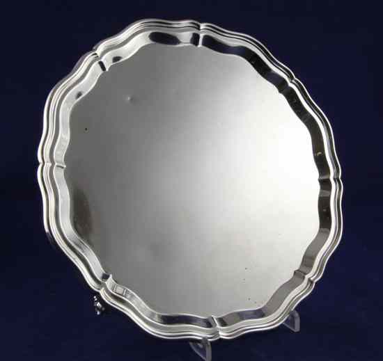 Appraisal: A 's silver salver by Harrods Ltd of shaped circular