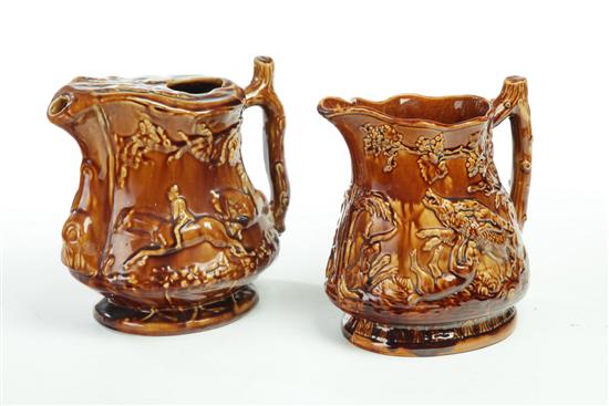 Appraisal: ROCKINGHAM PITCHER AND BEER PITCHER Pitcher with hunt scenes marked