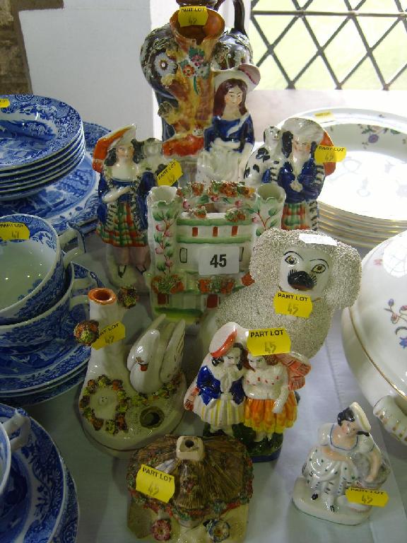 Appraisal: A collection of th century Staffordshire wares comprising a pair