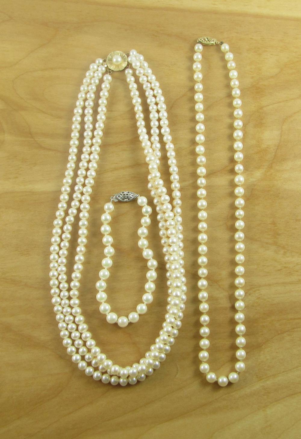 Appraisal: THREE ARTICLES OF PEARL AND FOURTEEN KARAT GOLD JEWELRY -