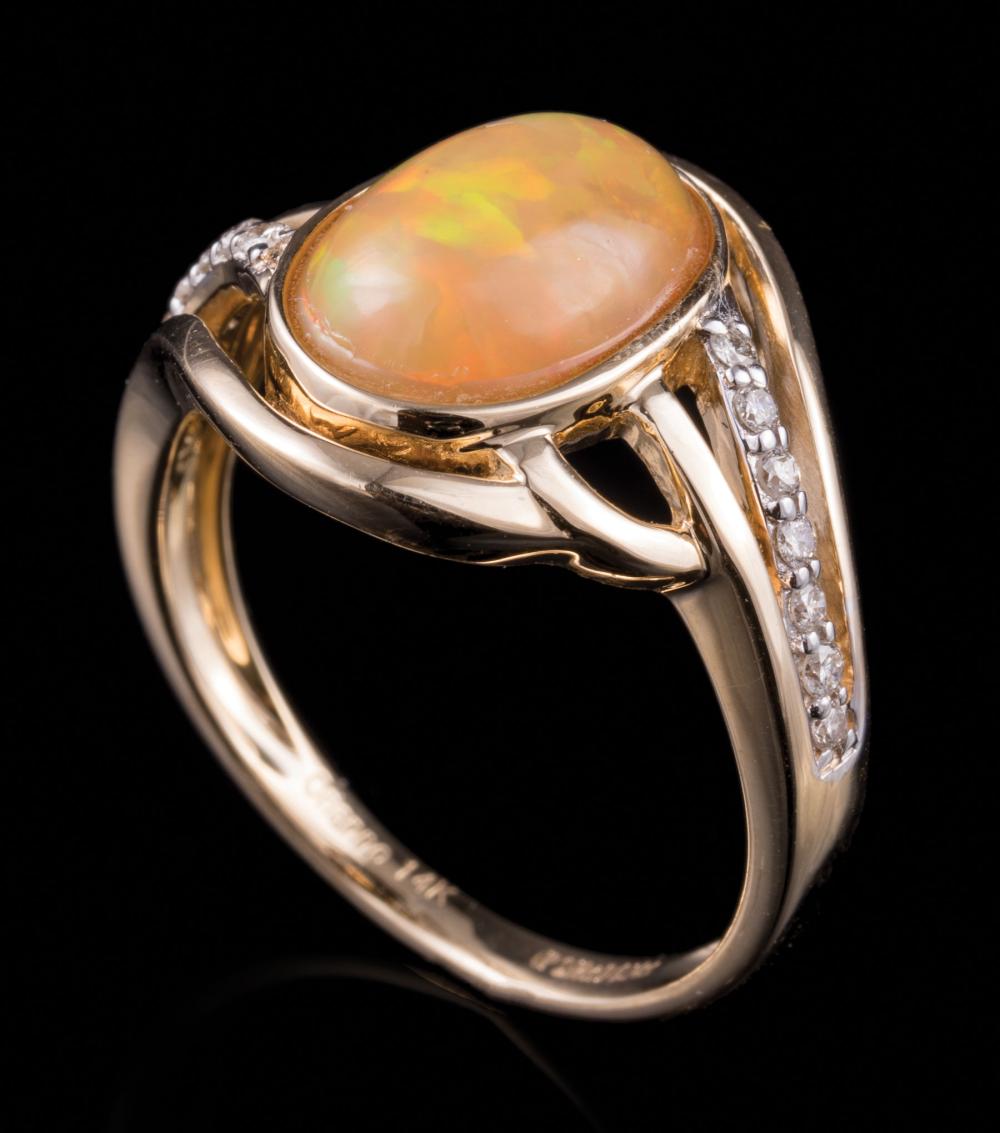 Appraisal: kt Yellow Gold Opal and Diamond Ring center bezel set