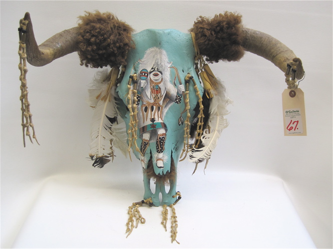 Appraisal: BUFFALO SKULL with horns Hand painted against turquoise painted ground