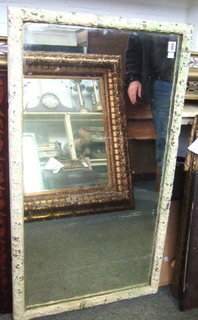 Appraisal: A th century rectangular wall mirror with scroll moulded frame