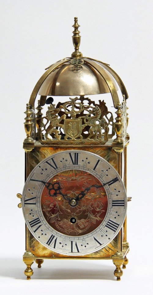 Appraisal: A brass lantern clock of th Century design the case