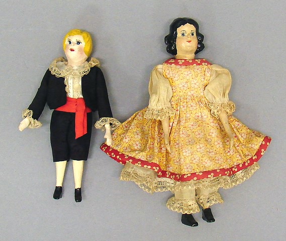 Appraisal: Pair of hand carved wood dolls Hitty doll carved and