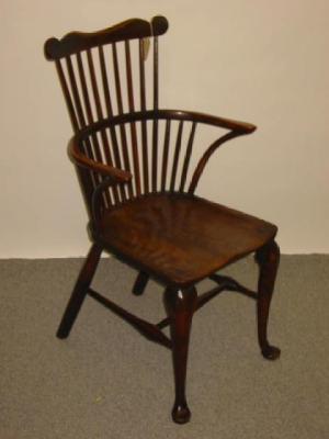 Appraisal: A FRUIT WOOD WINDSOR COMB BACK ARMCHAIR Thames Valley late