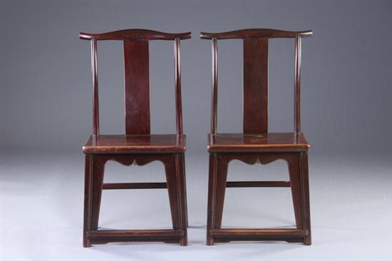 Appraisal: PAIR CHINESE YOKE BACK LACQUERED ELMWOOD CHAIRS th century Shanxi