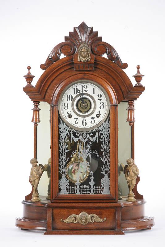 Appraisal: GILBERT OCCIDENTAL SHELF CLOCK Eight day time and strike clock