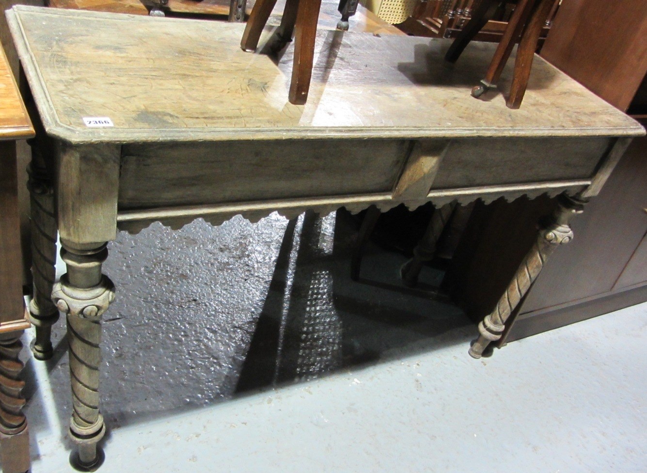 Appraisal: An early th century oak side table with end drawer