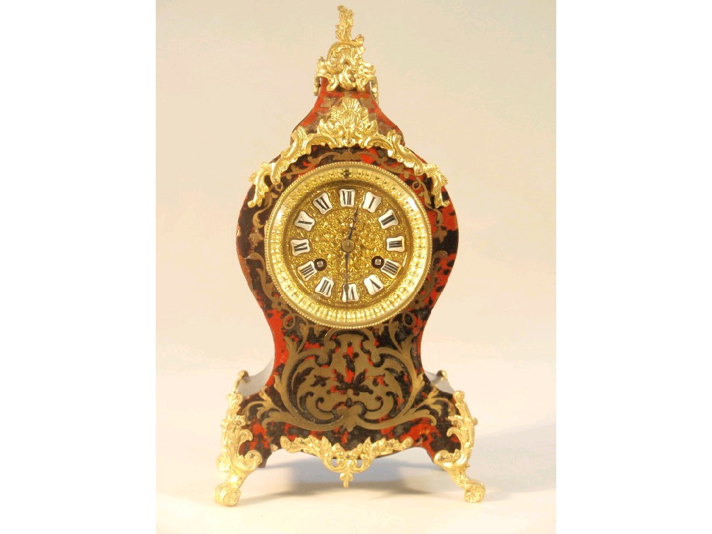 Appraisal: A thC French Boulle mantel clock the embossed gilt dial