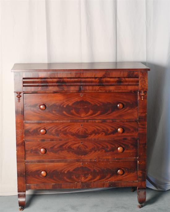 Appraisal: An Empire Mahogany Chest of Drawers having an ogee molded