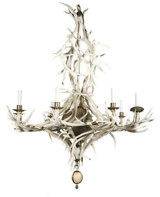 Appraisal: Metal Mounted Antler Eight-Light Chandelier the antlers with a white