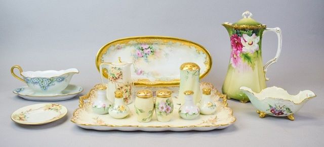 Appraisal: German and Austrian Porcelain Tableware Grouping Gilt and floral hand