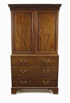 Appraisal: An early George III mahogany cabinet on chest the pierced