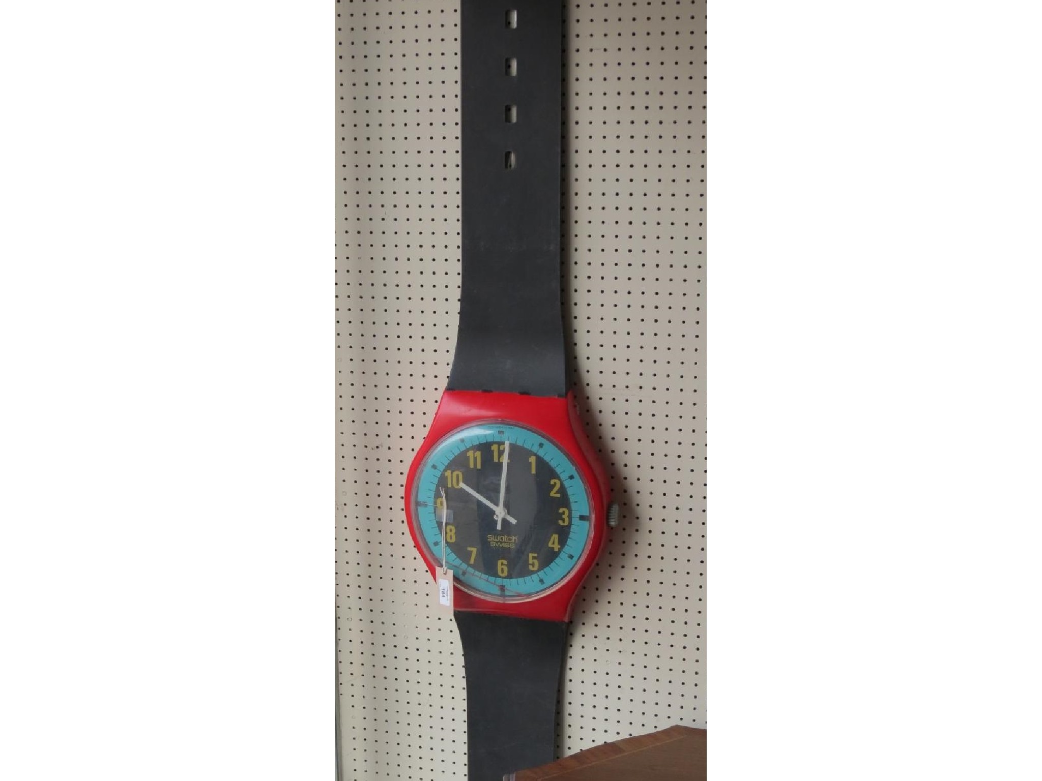 Appraisal: An unusual Swatch shop sign over-sized wristwatch with coloured dial