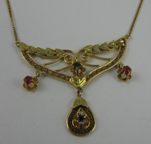 Appraisal: SAPPHIRE RUBY AND K GOLD PENDANT NECKLACE the pendant suspended