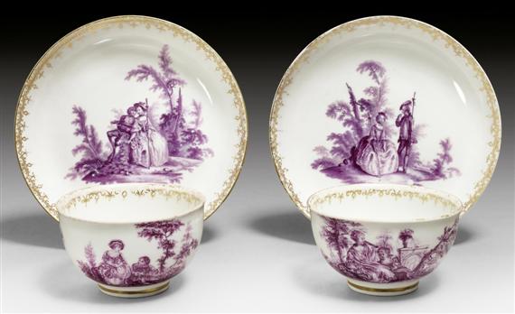 Appraisal: PAIR OF CUPS AND SAUCERS WITH WATTEAU SCENES IN PURPLE