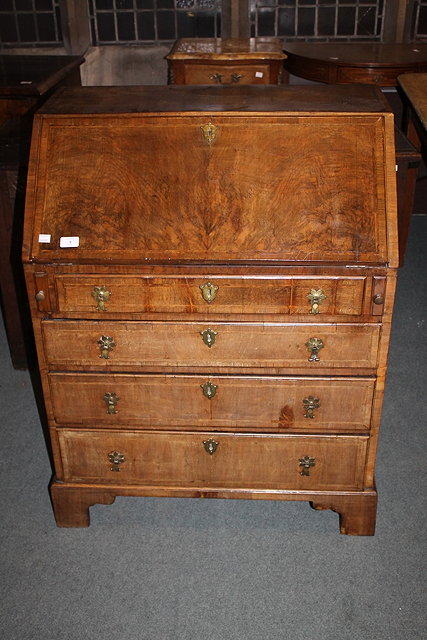 Appraisal: AN TH CENTURY WALNUT BUREAU bureau section containing four small