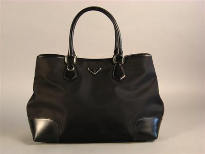 Appraisal: Prada black nylon and leather tote bag With silver hardware