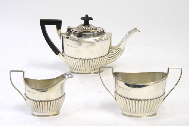 Appraisal: Victorian Queen Anne style bachelor's three piece teaset the teapot