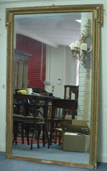 Appraisal: A Regency style overmantel mirror the gilt plaster frame with