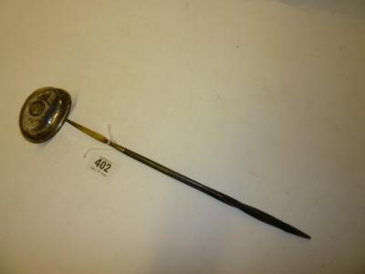 Appraisal: A GEORGIAN PUNCH LADLE the oval bowl with everted rim